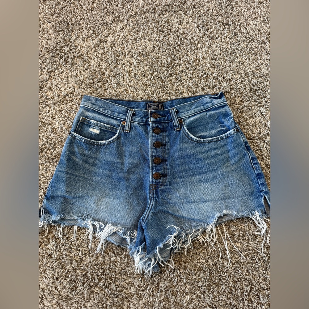 Abercrombie distressed shorts with button closure. Size 30/10.